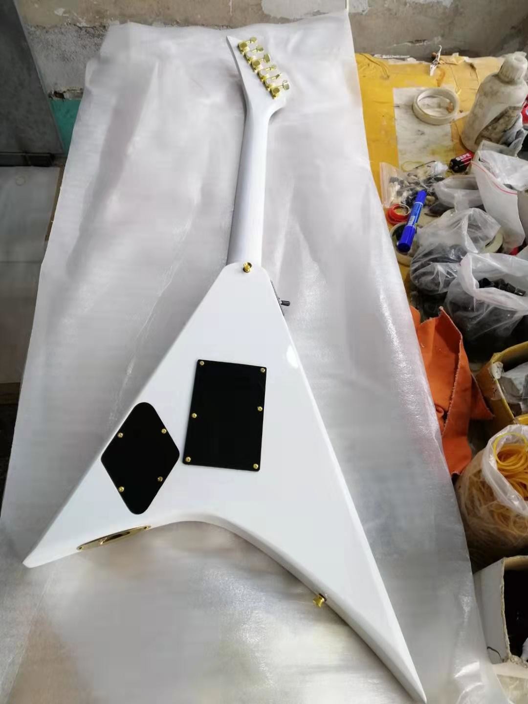 V shape 6 string electric guitar, white body, gold hardware, Fingerboard ebony, free shipping