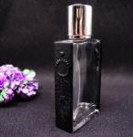 empty bottle of imported perfume recycled glass bottles black blue red pink
