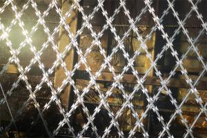 Quality South Africa Bto22 Hot Dipped Galvanized Concertina Razor Barbed Wire Fence For Prision wholesale