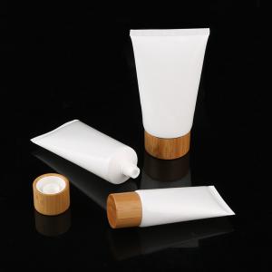 Quality wholesale empty 30ml plastic soft cosmetic tube, 60ml plastic white cream tube with bamboo cap, empty PET soft tube wholesale