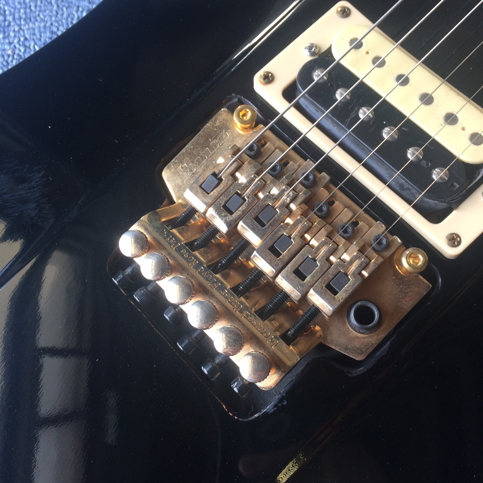 High quality custom electric guitar, rosewood fingerboard, black electric guitar,Tremolo system