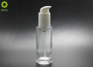Quality Luxury Cosmetic Packaging 80ml Round Flat Glass Serum Lotion Bottle With Self Lock Pump wholesale