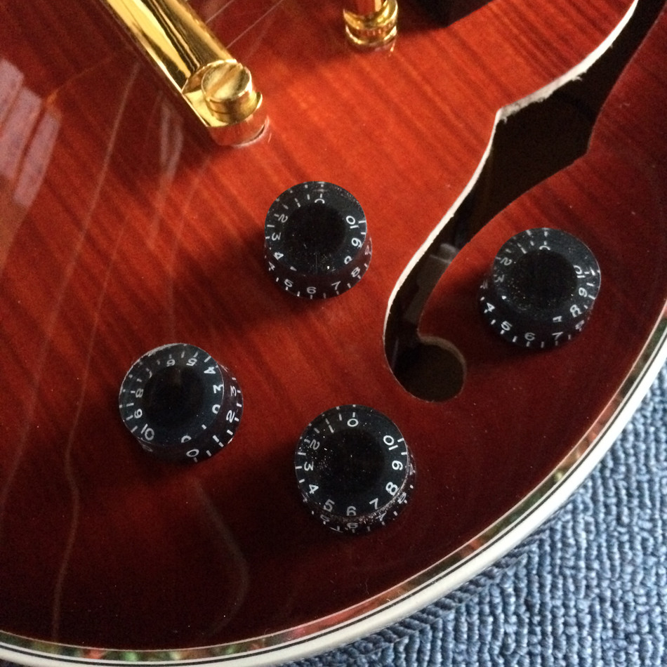 A new style of custom guitar, double F holes,Gold hardware,Flame Maple Top & Back