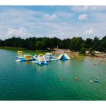 0.9mm PVC Tarpaulin Inflatable Floating Water Park Games 100 Person Capacity