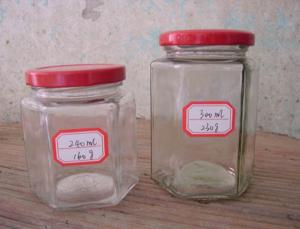 Quality 240ml 300ml hexagon glass jar for honey wholesale