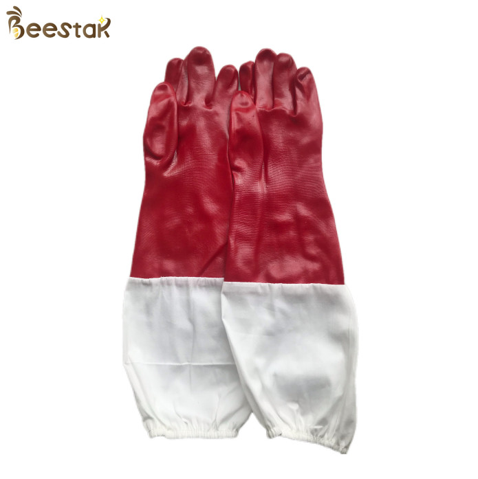 Hands Protecting Honey Beekeeping Gloves With White Canvas And Red Rubber