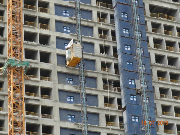 Cheap High Safety Guide Rail Rack Pinion Building Construction Lift for sale