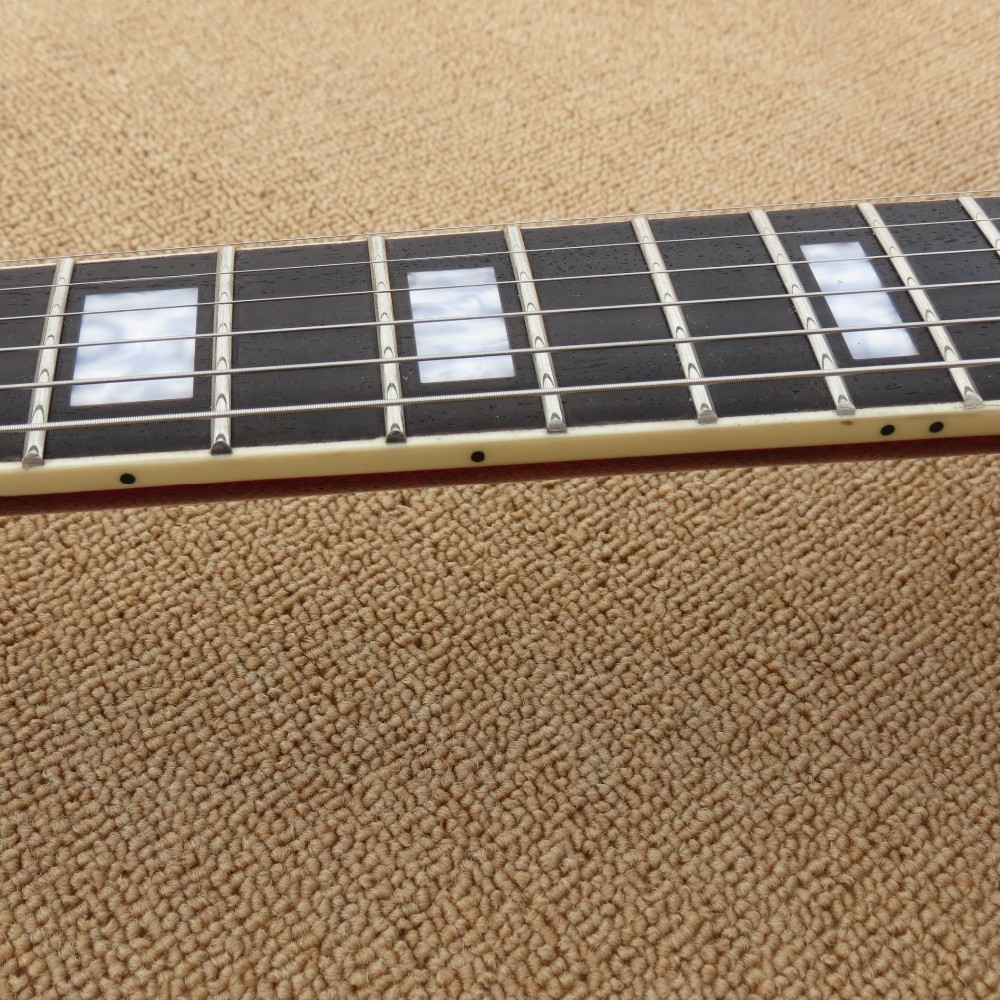 Hollow body electric guitar quilt flame on body top and back ,Natural wood color,gold hardware