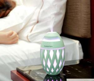 China 320ml Portable Mini Mist Car Rugby Humidifier USB Rechargeable Olive Ball Humidifier on sale