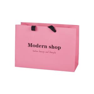 Quality Pink 250g Coated Paper Bags Packaging Clothing With Ribbon Handle wholesale