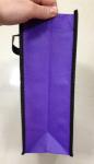 Nonwoven shopping bag with handles