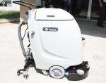 White Floor Scrubber Dryer Machine Running Alongside Pressure Additional System