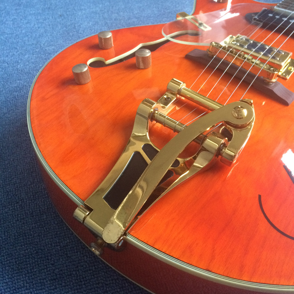 Hollow body jazz electric guitar, Double F holes,Ebony Fingerboard,Tremolo system,white guitar