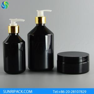 Quality 250ml/500ml black modern round plastic bottle and golden pump, 250g black plastic jar wholesale