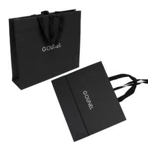 Quality Full Embossing Black Dyed Garment Paper Shopping Bags With Handles wholesale
