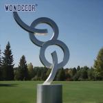 Large outdoor park geometric letter rusted steel sculpture