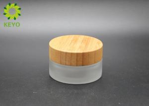 Quality Compact Frosted Glass Cosmetic Bottles And Jars For Cream With Bamboo Lid wholesale