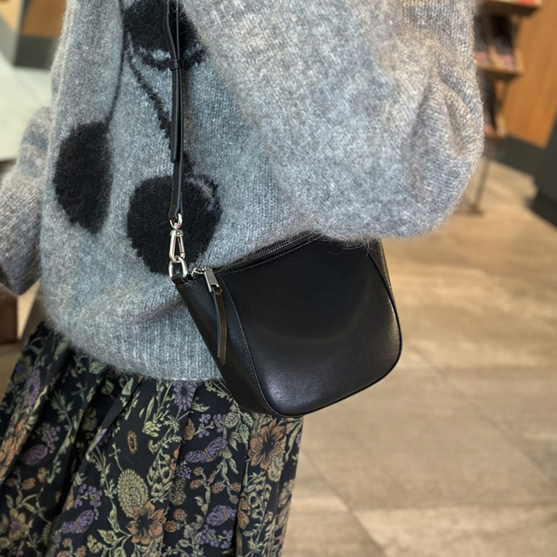 Upgrade Your Wardrobe with 2024 Spring's Flocked Cowhide Bag Versatile and Timeless
