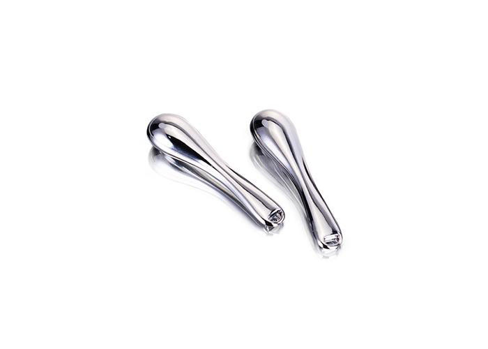 Metal silver eye cream massage spatula for applying eye cream, serum and facial mask.