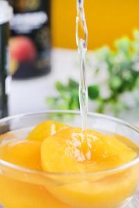 Quality Regular HALAL Sweet Canned Yellow Peach In Light Syrup Lower Blood Sugar And Lipids wholesale