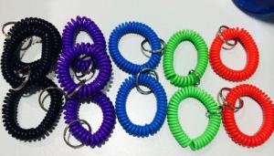 Quality Top quality perfect look PU plastic assorted color 2.5x10x55mm wrist coil wristband w/ring wholesale