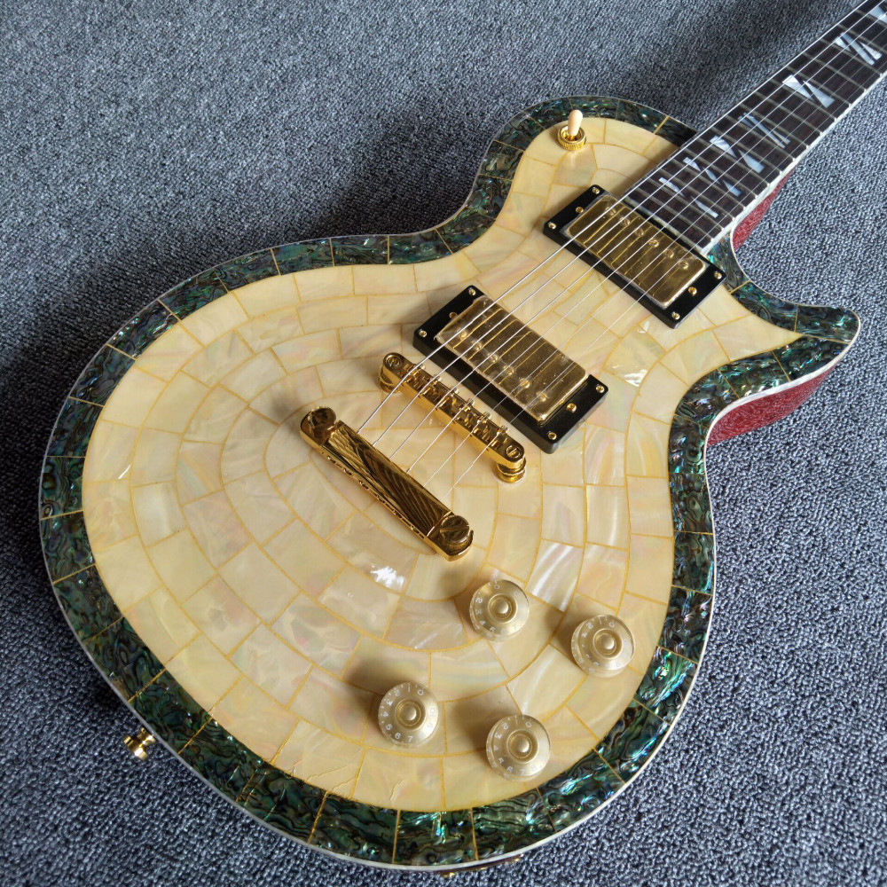 New arrival shell electric guitar with 6 strings guitar and gold pickups