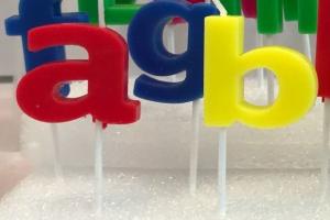 Quality Dripless Alphabet Letter Candles With White Plastic Holder For Birthday Party wholesale