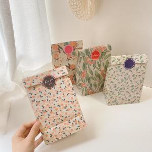 Quality Small Floral Folded Handle Present Paper Bags 30gsm-160gsm Wedding Paper Gift Bag wholesale
