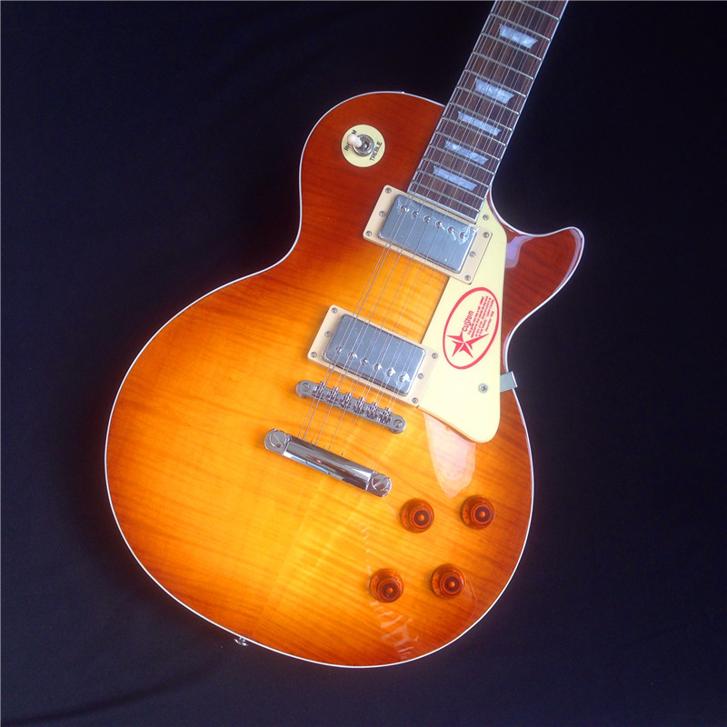 Standard LP electric guitar with gold hardware and flower inlay