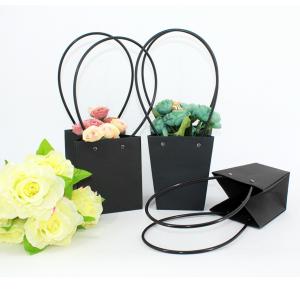 Quality Waterproof Flower Packaging Carry Kraft Paper Bag With Plastic Handle wholesale