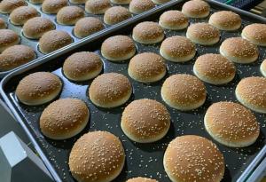 Quality 24000pcs-36000pcs per hour Direct Fired Hotdog Roll And Burger Bun industrial Production Line wholesale