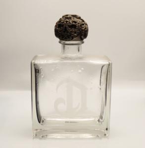 Quality Deleon Tequila Glass Bottle Embossed Engraving Sandblasting Glass Bottles wholesale
