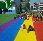 Eco Friendly Red Coloured Artificial Grass Playground Children Playing