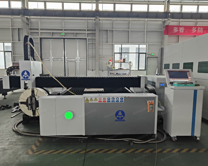 Full Automatic 6m Pipe Plate Cnc Fiber Laser Cutting Machine 3kw 1500*3000mm Exchange Table