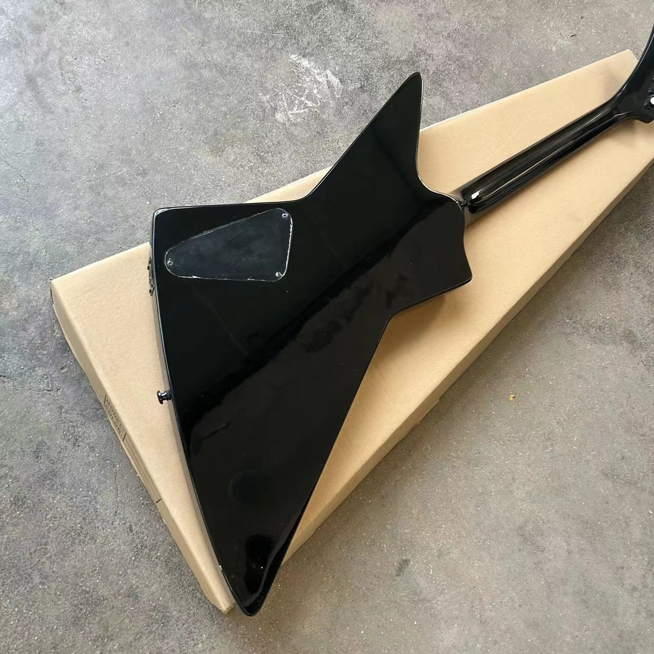 Custom special shape body ESP style electric guitar in black color glossing finish