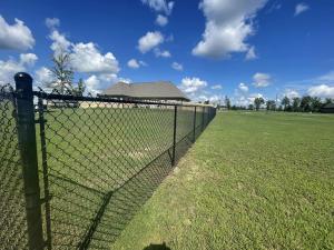 China Wholesale 6ft 7ft 9 Gauge 10 Gauge 11 Gauge Black Vinyl PVC Coated Hot Dip Galvanized Chain Link Fence For Sale on sale