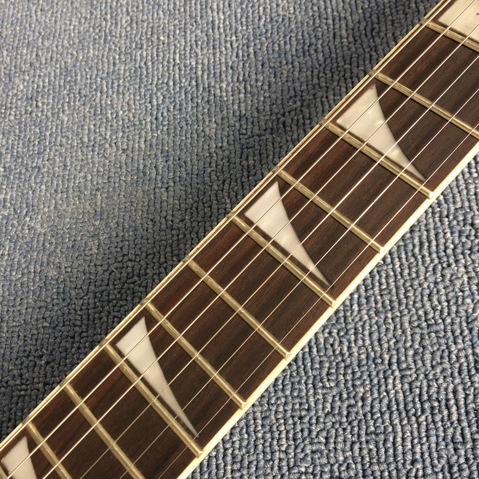 New high quality V type electric guitar,Rosewood, yellow circle black edge