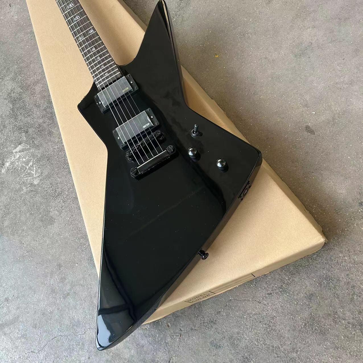 Custom special shape body ESP style electric guitar in black color glossing finish