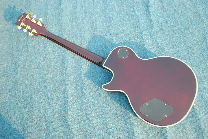 High Quality cheaper price LP custom Electric Guitar sunburst color center solid rosewood fingerboard,chrome parts, Whol