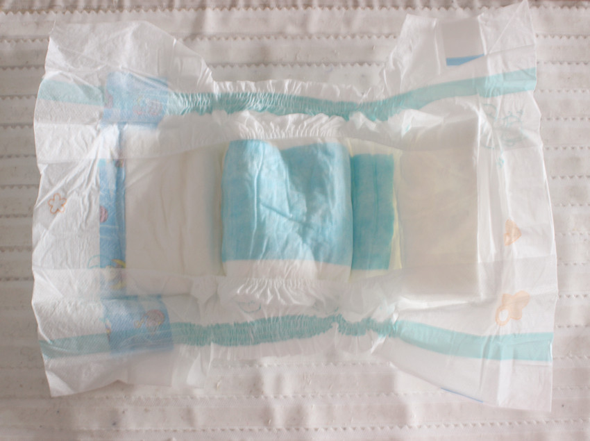 50pcs/bag B Grade Disposable Baby Diaper Stock Lot with Green ADL in Transparent Bag