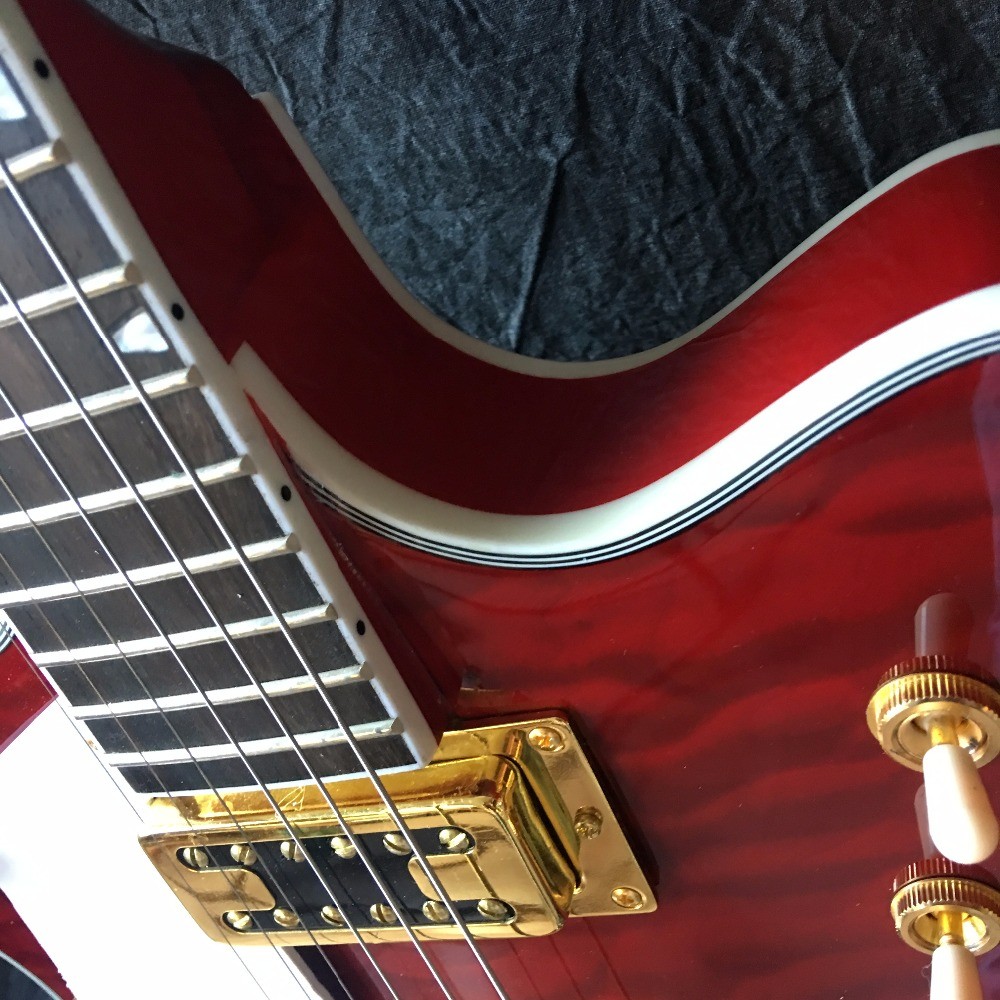 Grand Transparent red, gold tremolo. Free delivery, picture real shooting 333 jazz old electric guitar quilted maple top