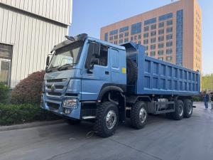 Quality 380hp Sinotruk Howo 8x4 Dump Truck 12 Wheels HW76 ZZ3317V3567B1R RHD Elegant Blue wholesale