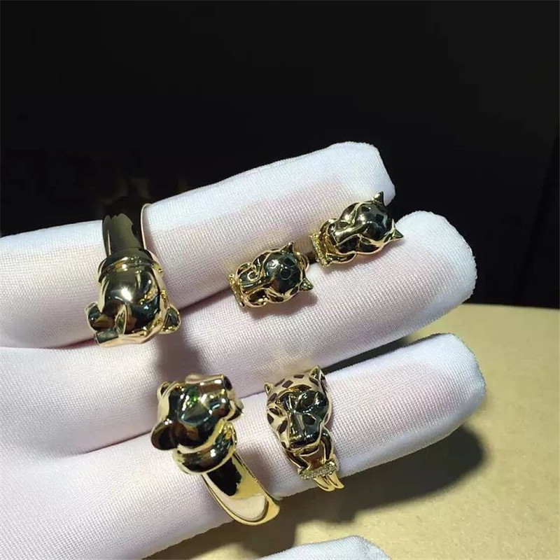 C Cheetah Earrings - showing the charm of courage, naughty or docile .18K gold, lacquer, diamond, shafle garnet, Onyx