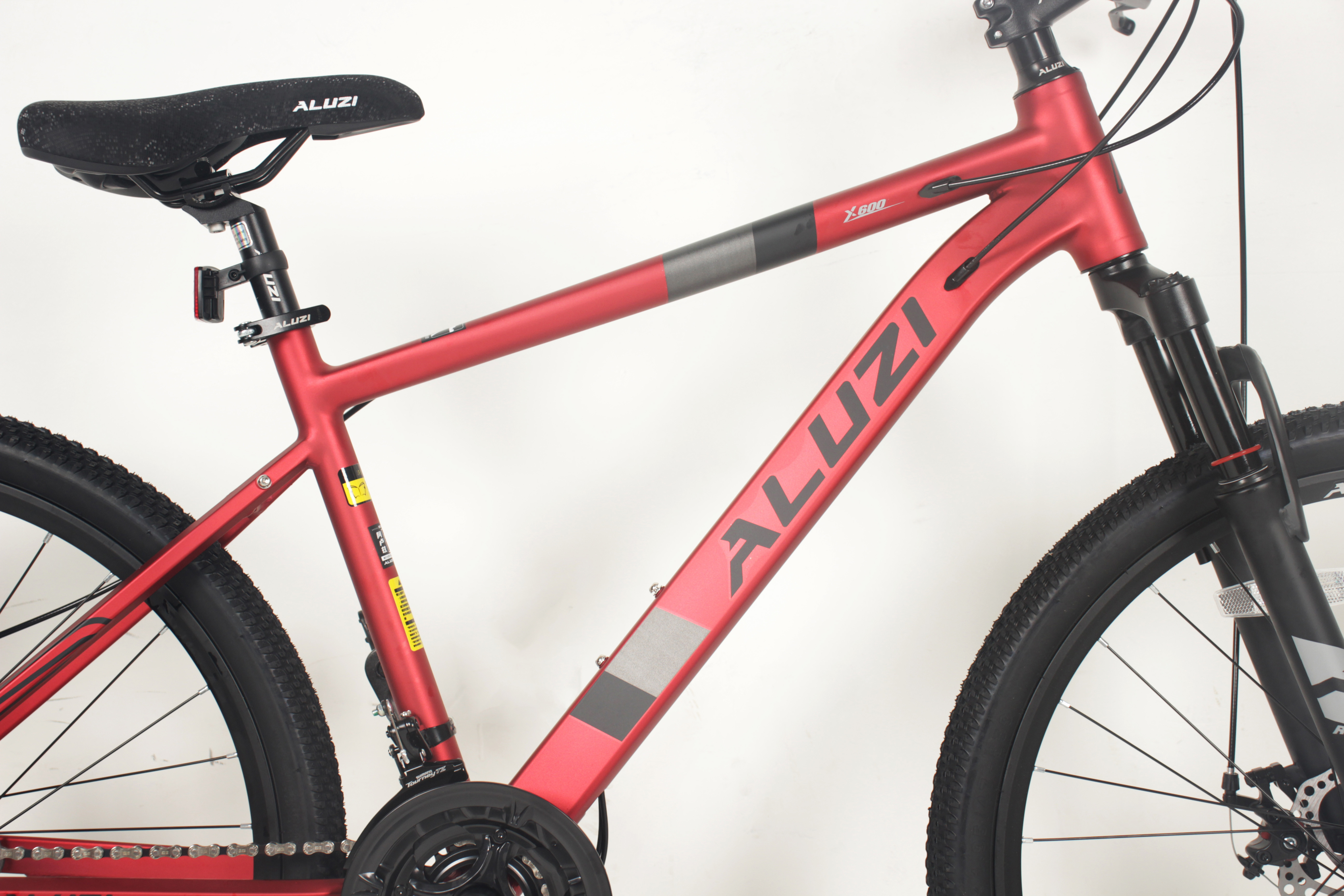 Carbon Steel 21-Speed youth mountain bike With Shimano Derailleurs And Suntour XCT Fork