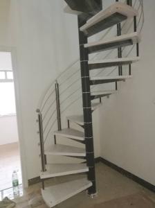 Quality Spiral StaircaseVH05S Spiral Stainless Steel Stair Tread Beech Curved Glass Handrail 304 Stainless Steel wholesale