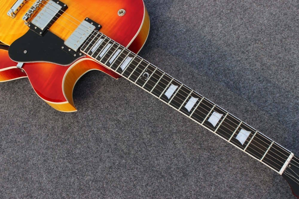 Hollow body ES137 jazz guitar with cherry burst color and chrome hardware