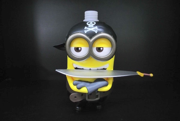 Yellow Color Cartoon Shampoo Bottle Have Sword With Universal Studios Logo