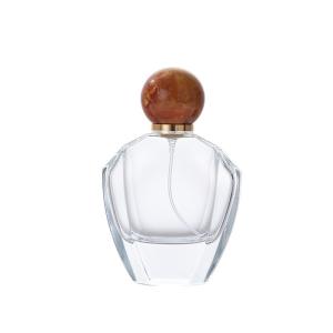 Quality 10ml 20ml 50ml 100ml Crystal Clear Perfume Glass Bottle with Cap Glass Body Material wholesale