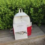 Schoolbag nansen is wearing a small fresh canvas backpack for high school