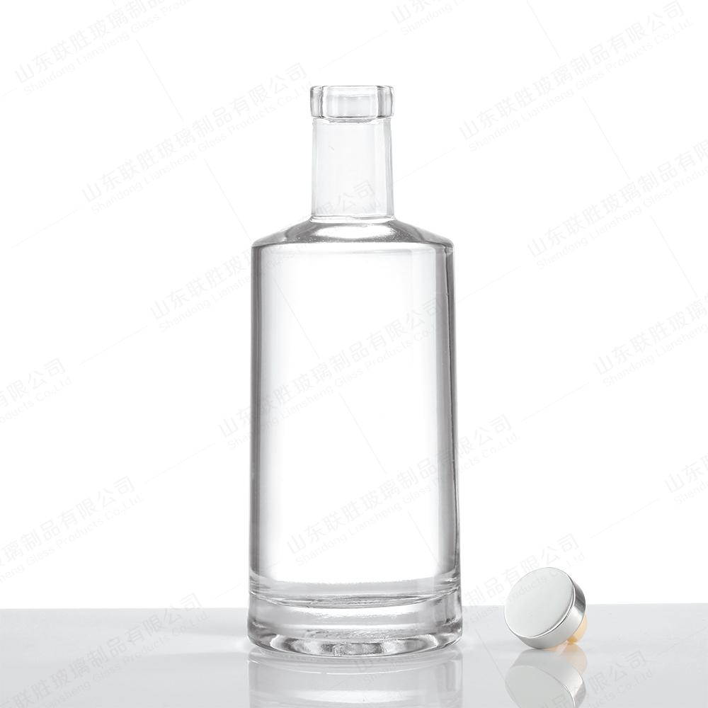 ODM 500ml 700ml 750ml Round Liquor Glass Bottle With T Sealing Cork